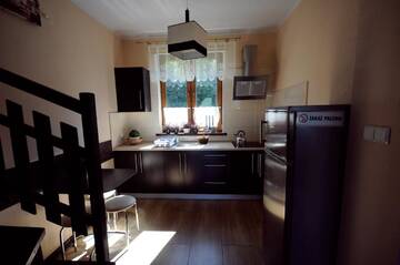 Фото номера Бунгало Делюкс Дома для отпуска Apart-House Bieszczady г. Леско 15